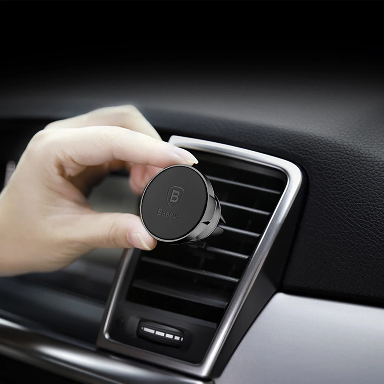 Attaching Baseus Small Ears Series SUER-A01 Magnetic Car Mount to air vent