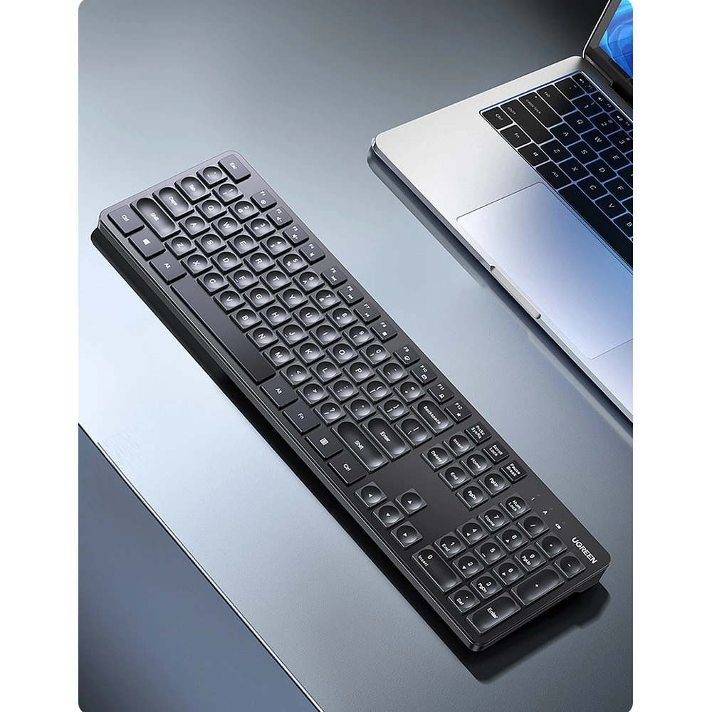 Ugreen KU004 wireless keyboard on a desk