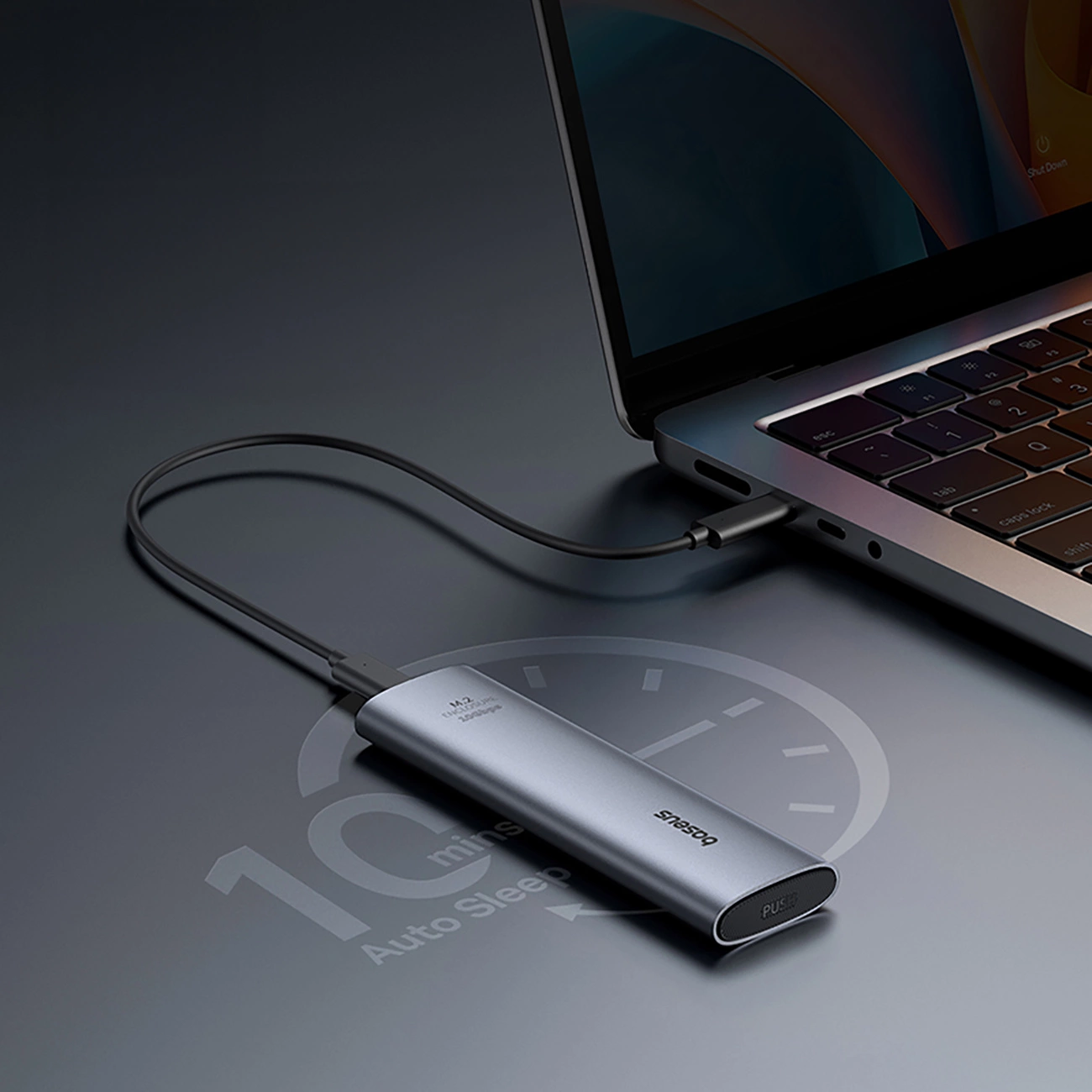 Laptop connected to Baseus FlyJoy M.2 SSD pocket