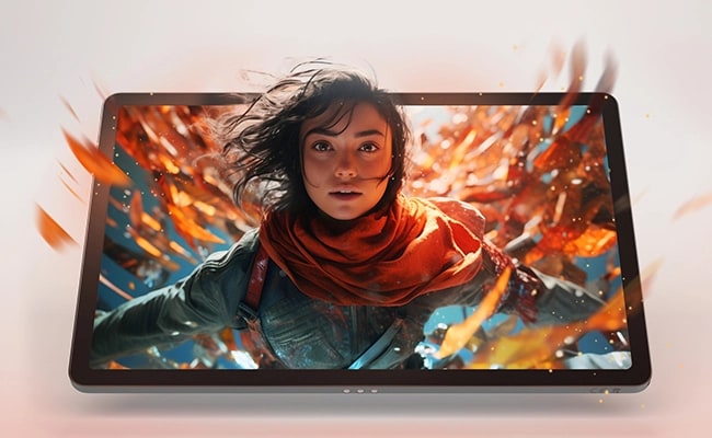 A young girl surrounded by autumn leaves emerges from the display of the Lenovo Idea Tab tablet.