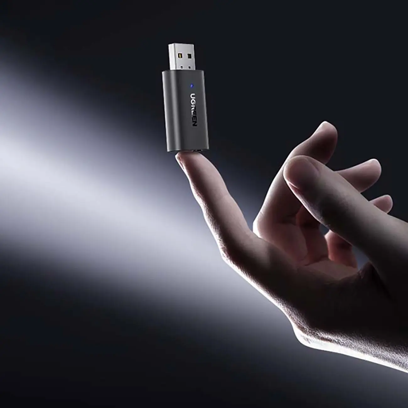 Ugreen CM523 wireless audio adapter with 3.5mm mini jack connection
