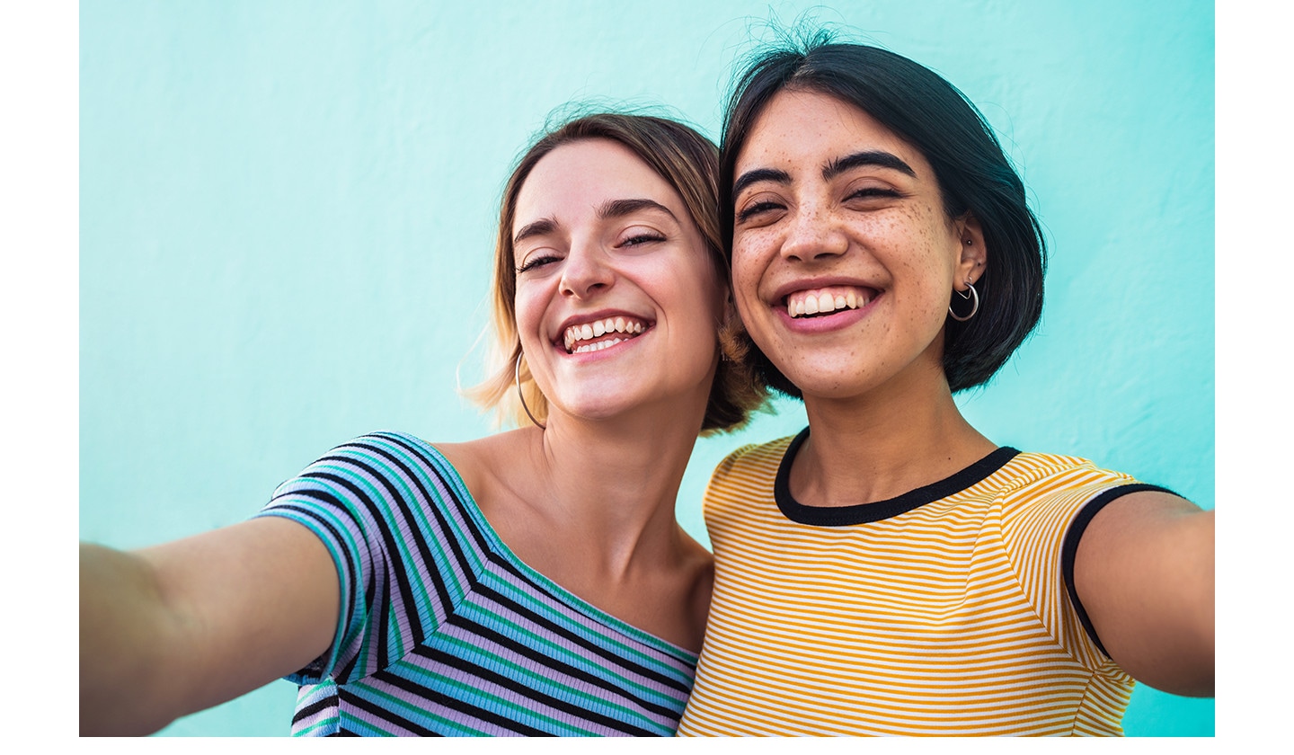 Two people taking a clear selfie with Galaxy A27 5G