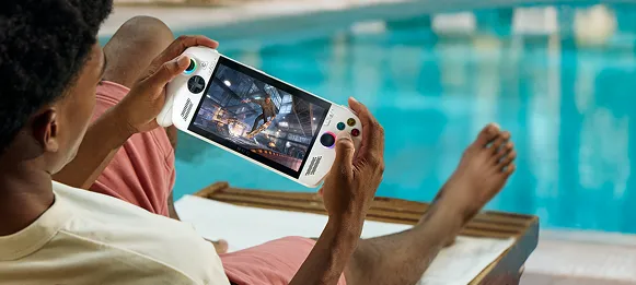 ROG Xbox Ally being used beside a swimming pool