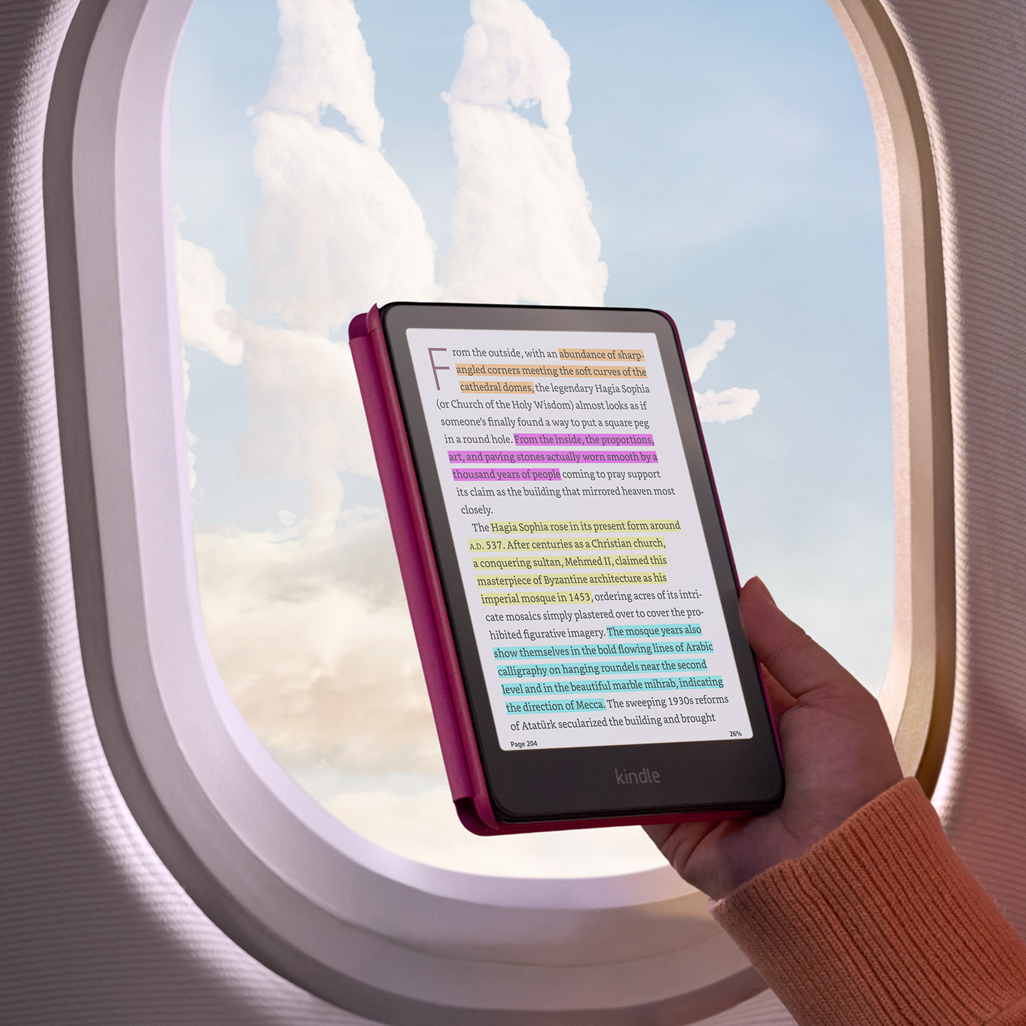 Kindle Colorsoft displaying highlighted passages in multiple colors during travel