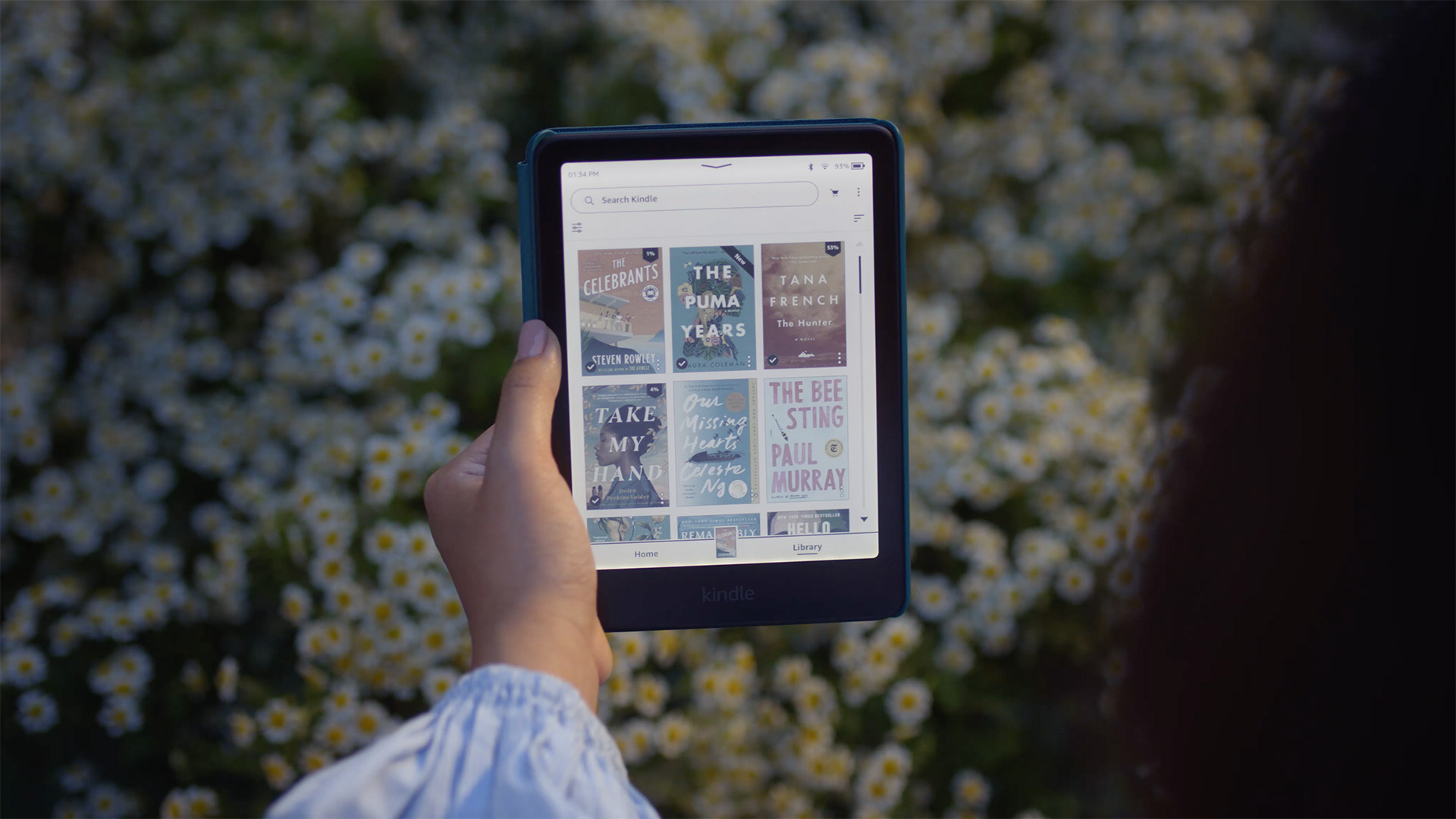 Kindle Colorsoft being read outdoors