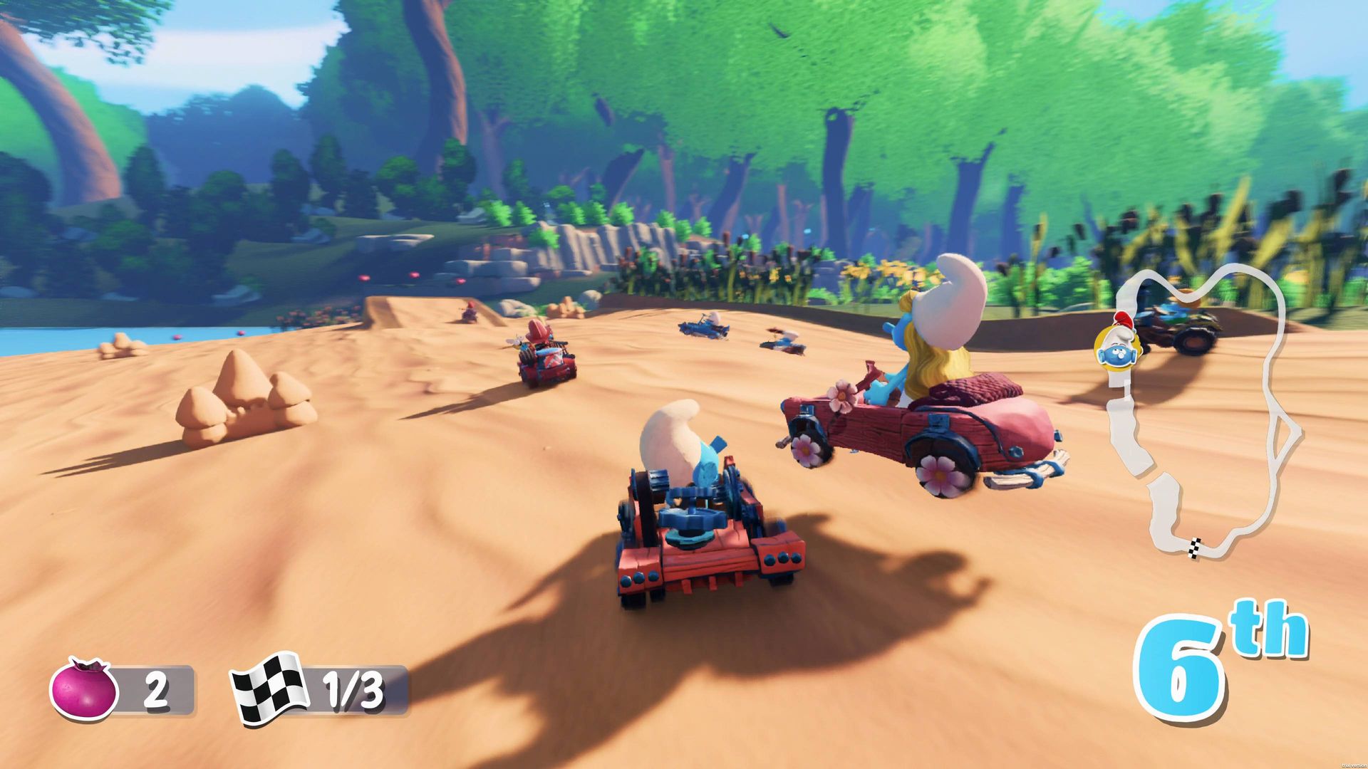 Smurfs Kart racing gameplay on a colourful Smurfs track