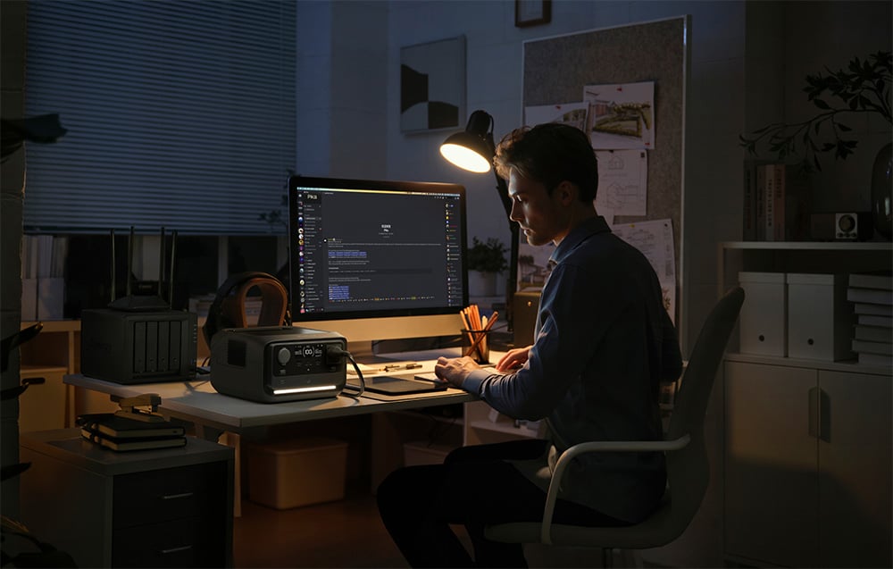 EcoFlow RIVER 3 Plus powering a desktop computer during an outage