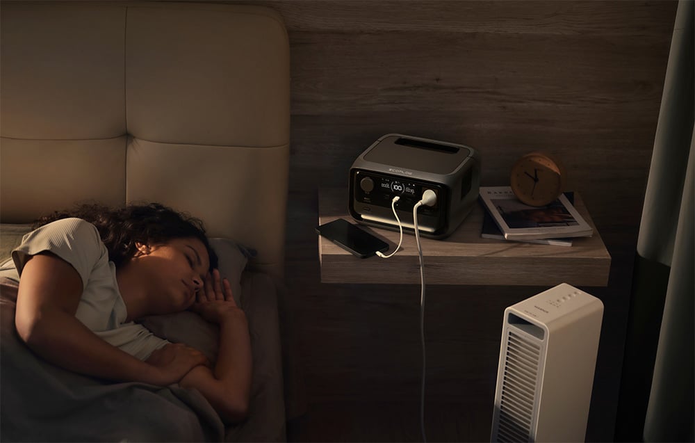 EcoFlow RIVER 3 Plus operating quietly beside a bed at night