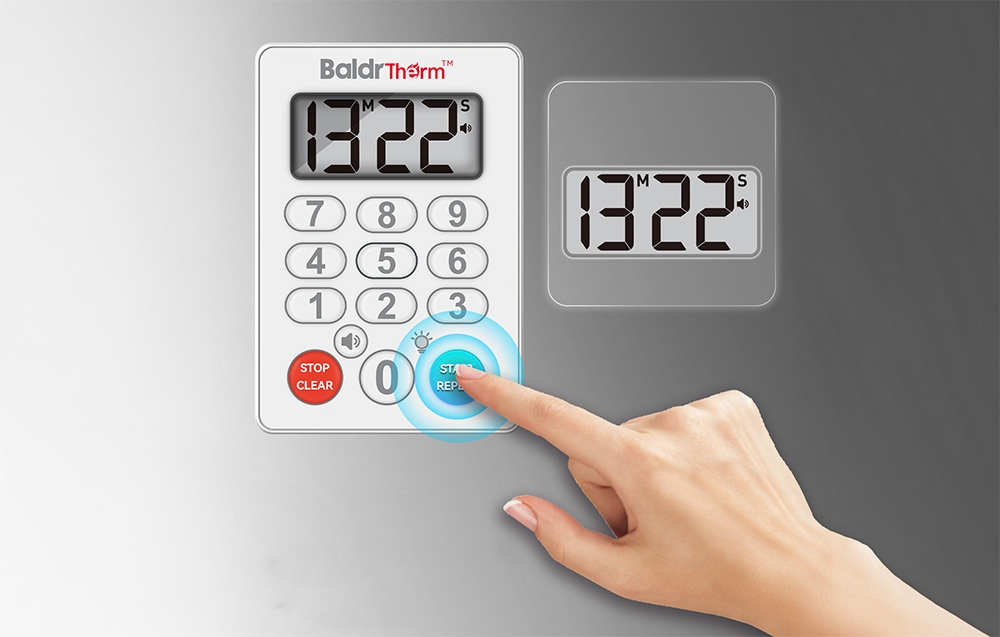 Hand entering a countdown time on the BALDRTHERM E0575S numeric keypad
