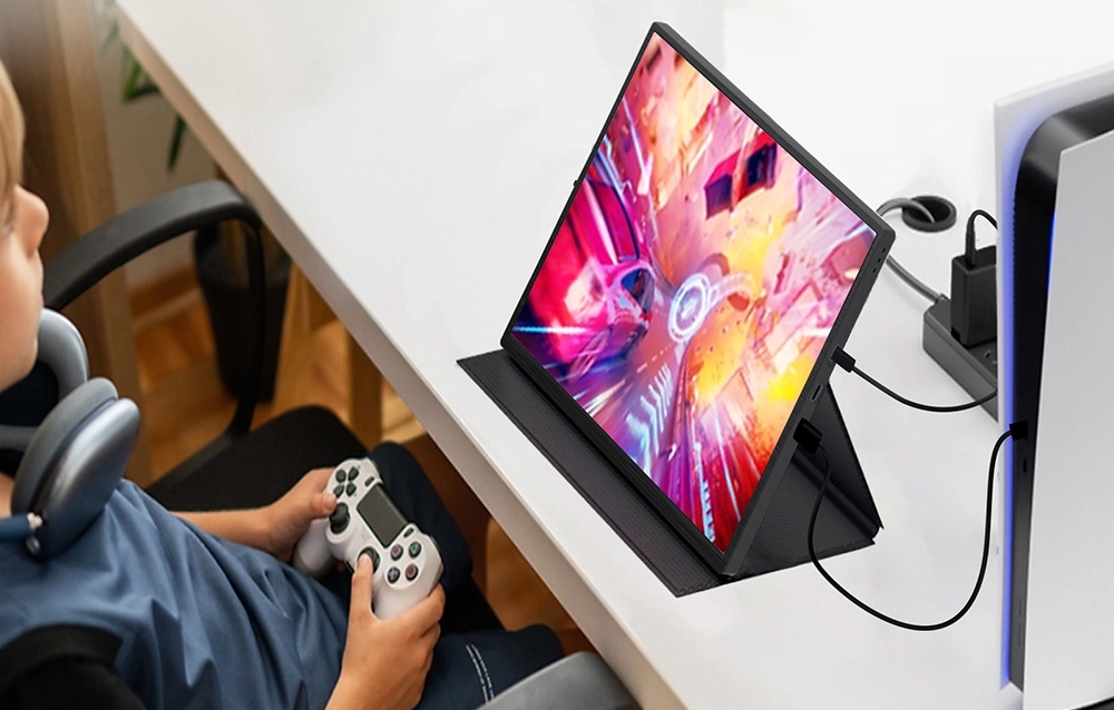 Portable ZEUSLAP monitor connected to a PlayStation gaming setup